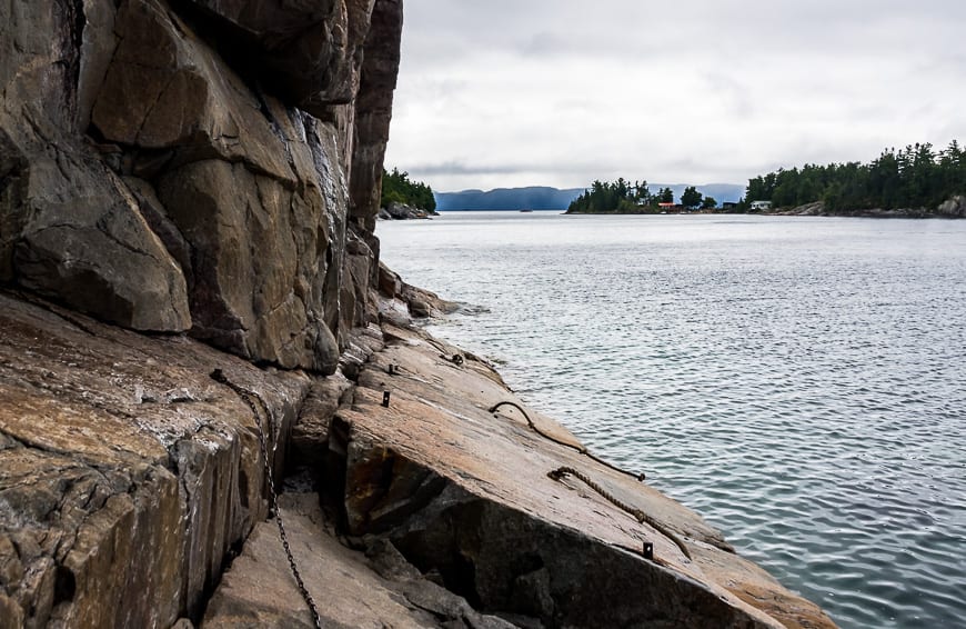 The pictographs are on the vertical wall. This is not a place you want to be in a storm!