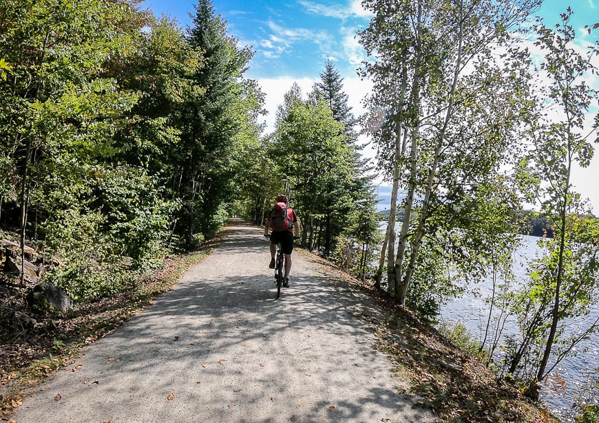 Biking a pretty lakeside section of Le Petit Train du Nord near Mt. Tremblant