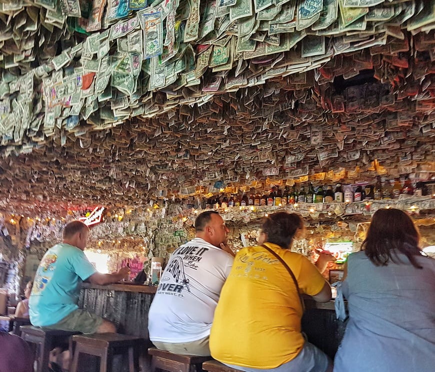 The walls of No Name Pub literally covered with dollar bills