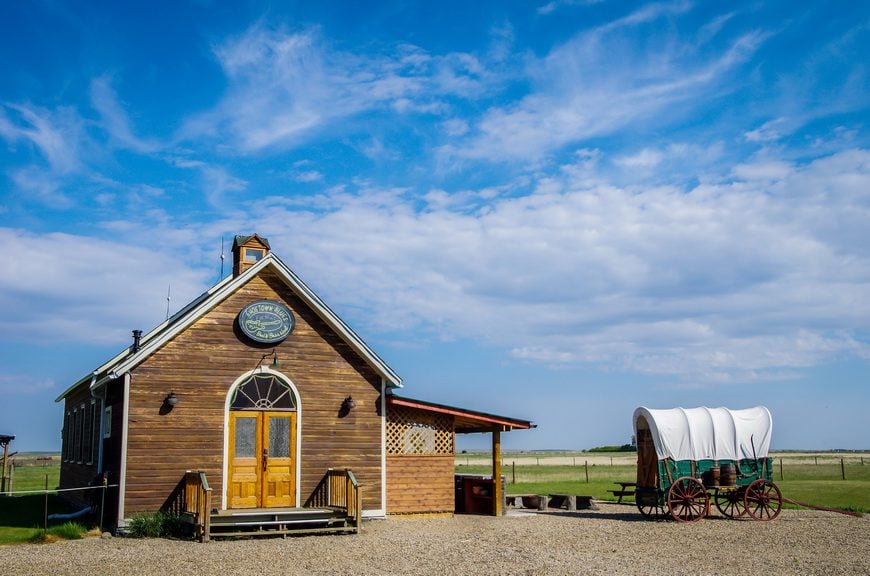 Stay in a chuck wagon in the Ghosttown Blues Bed & Breakfast - one of the fun places to visit in Saskatchewan