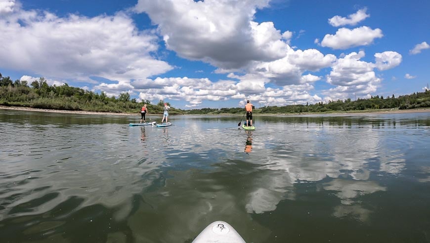 Places to visit in Saskatchewan include the South Saskatchewan River on an SUP