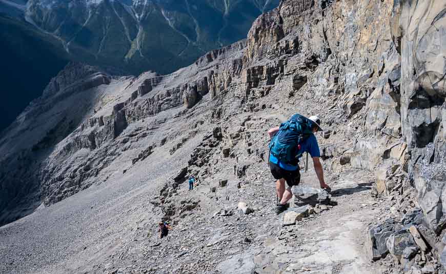 Man descending on exposed scree slopes