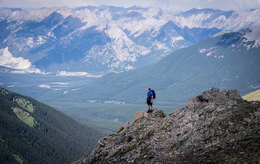 John enjoying an airy view off the Mount Allan summit - the highest of the Kananaskis Trail hikes