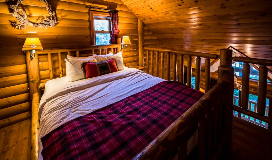 Our queen size bed upstairs in the loft at Baker Creek by Basecamp