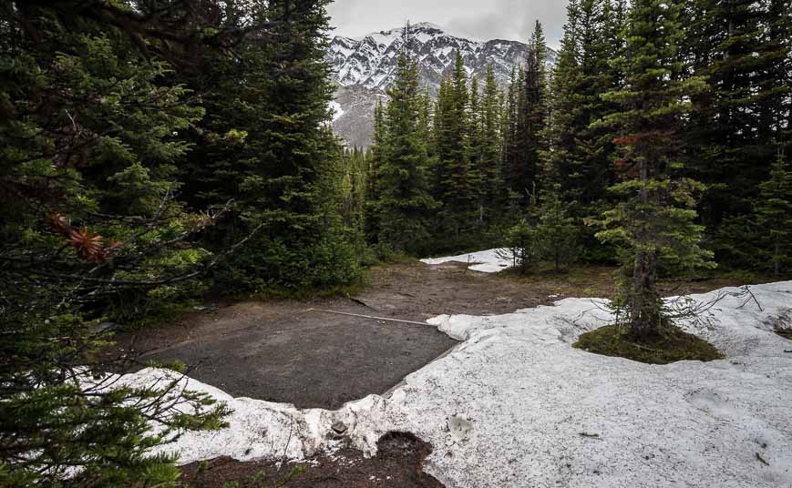 Some of the campsites at Three Isle Lake in early July are quite muddy 