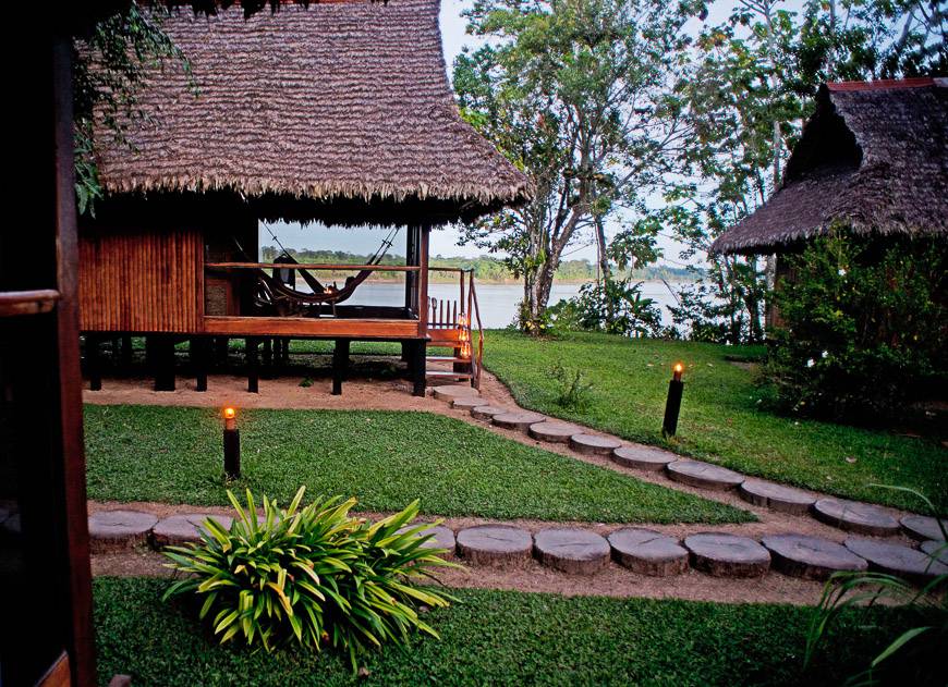 Inkaterra cabins in sight of the Amazon River