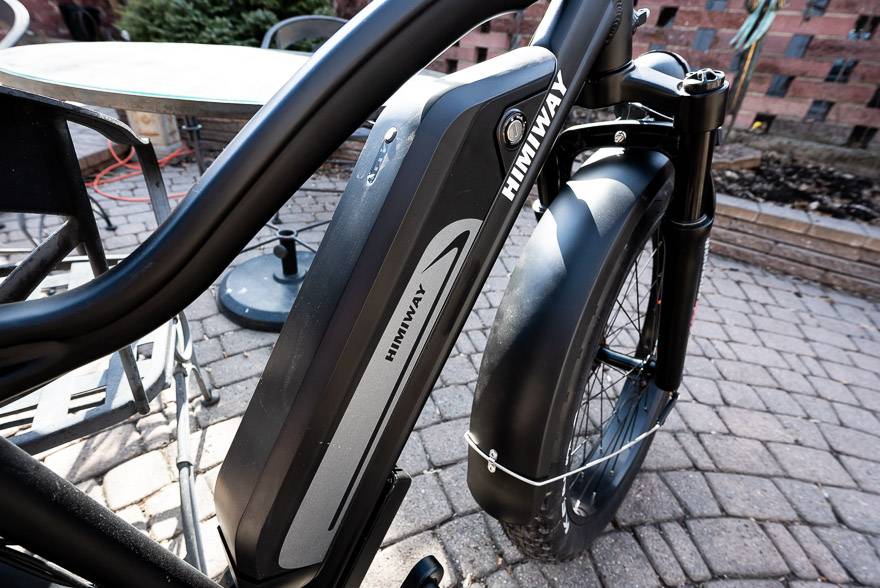 The battery pack on the Himiway bike is locked on