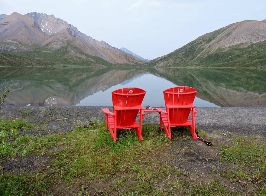 The signature Parks Canada chairs overlook Backbone Lake at Nááts'įhch'oh National Park Reserve. Photo courtesy: Marlis Butcher