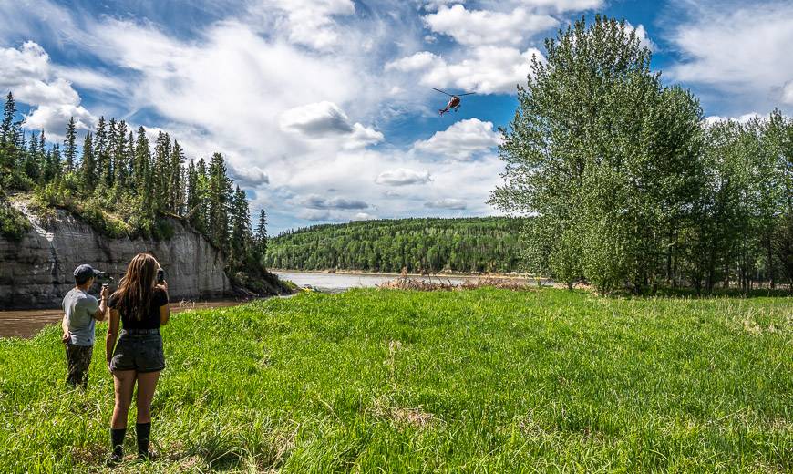 Watching the helicopter come in to one of the few open accessible areas near Grand Rapids Wilderness Adventures