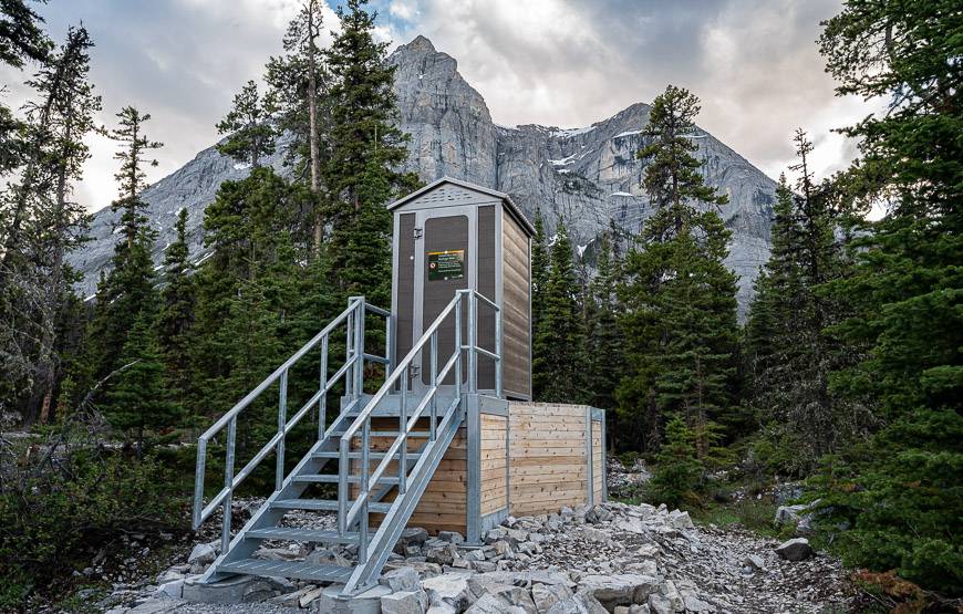 Quite the backdrop for the outhouse