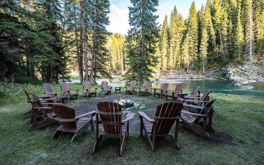 Fire pit with chairs set up down by the Ghost River