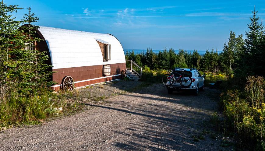 One of the covered wagon glamping units at Broadleaf Ranch