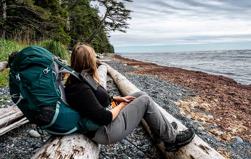 My friend Gemma from Off Track Travel waiting for the black bear down the beach to head into the forest