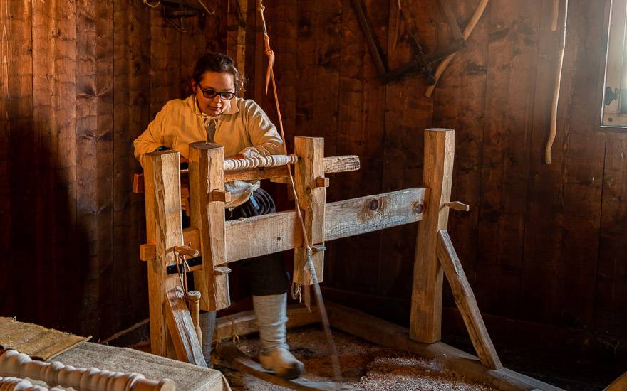 Hard at work turning wood by natural light