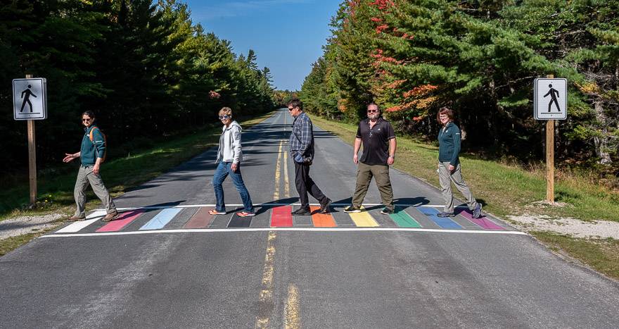 The rainbow-coloured crosswalk connects the Mersey River Trail with the Ukme'k Trail