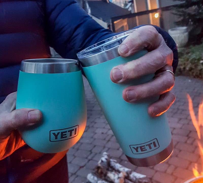 John and I putting the YETI wine tumbler (on the left) and the YETI Rambler 20 (on the right) to use outdoors