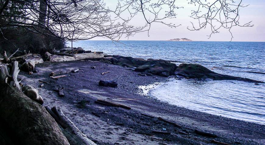 Cycling the Gulf Islands - on Saturna Island with Little pocket beaches along the road