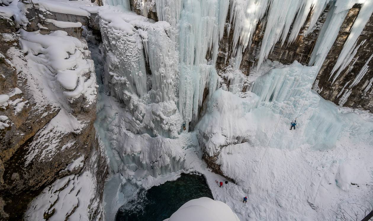 Ice climbers on Upper Johnston Canyon Falls in winter