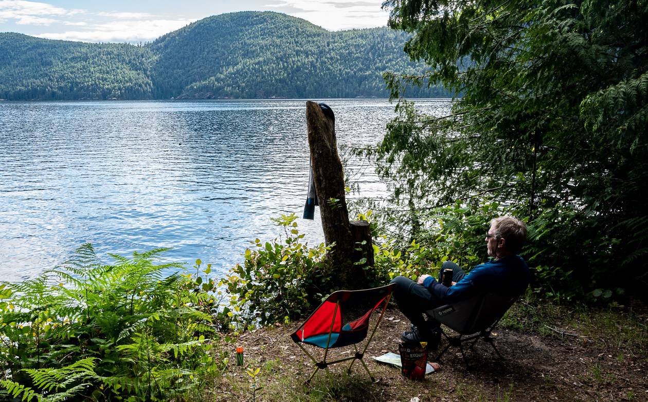 Enjoying our camp chairs at a campsite with a view