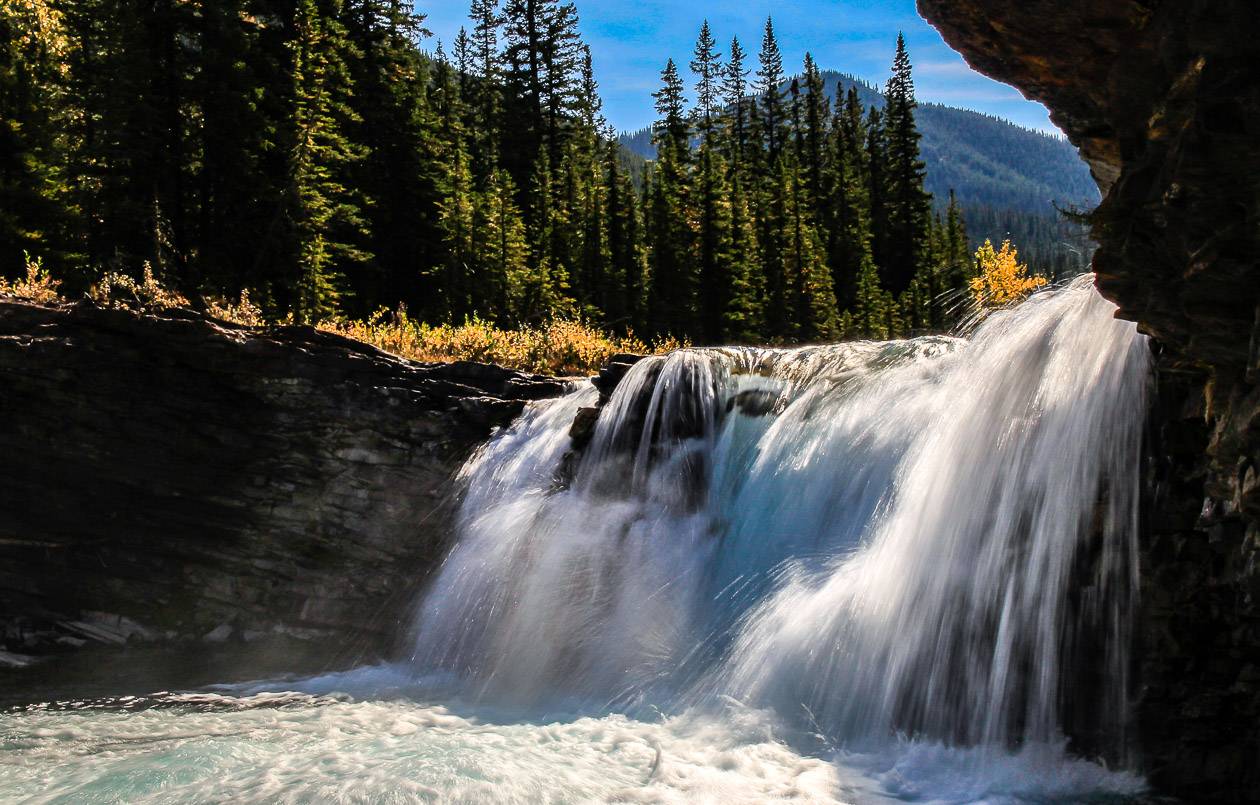 Close-up view of Sheep River Falls - one of the popular Alberta waterfalls to visit