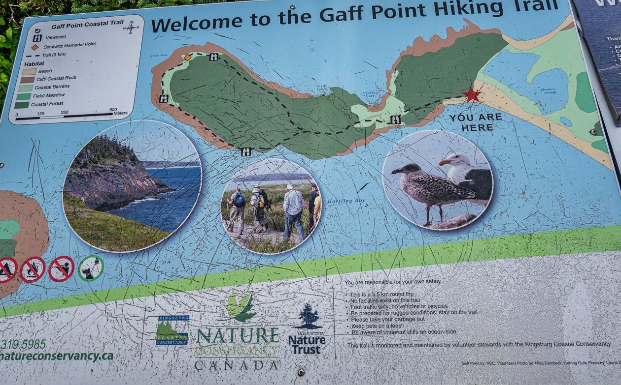 Signage at the official start of the Gaff Point hiking trail seen at the end of the beach