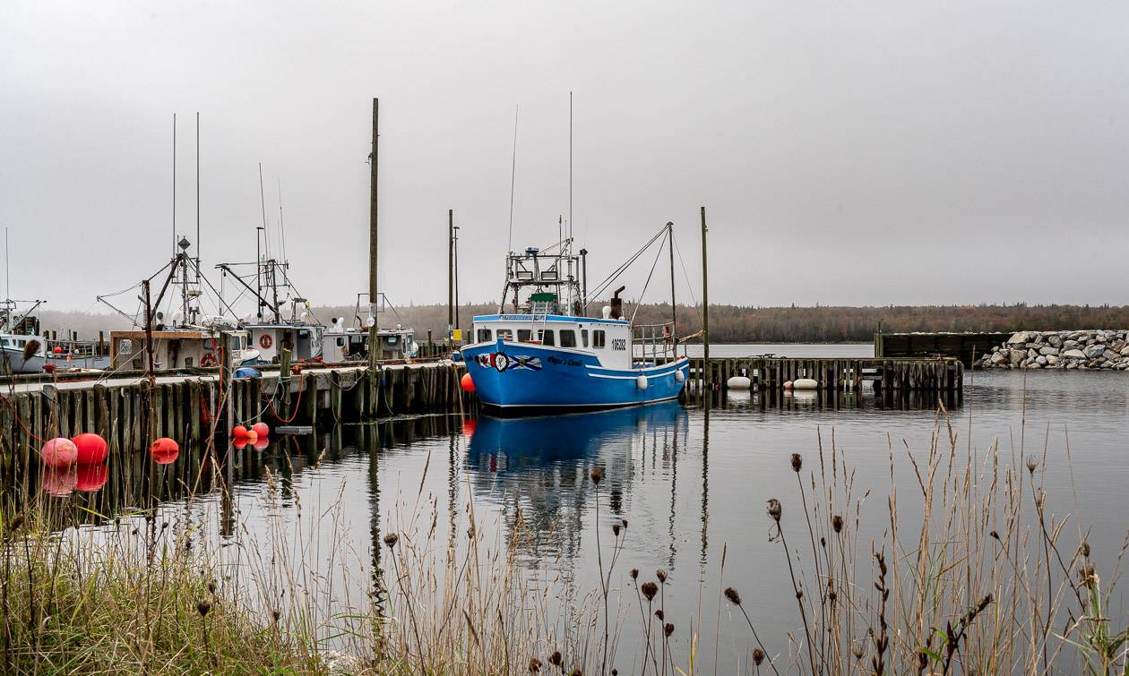 Working fishing boats at the end of East Side Port L'Hebert Road