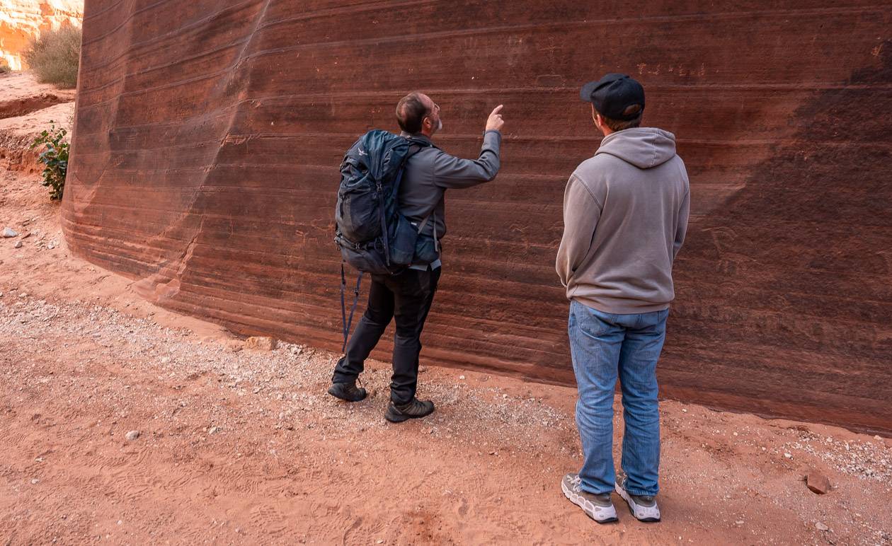 Our guide pointing out the petroglyphs - which would be easy enough to walk by