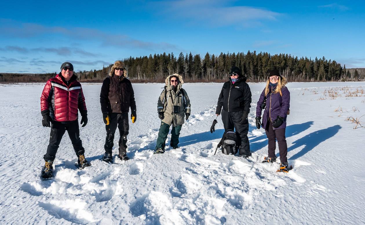 Our group snowshoeing off trail in Prince Albert National Park