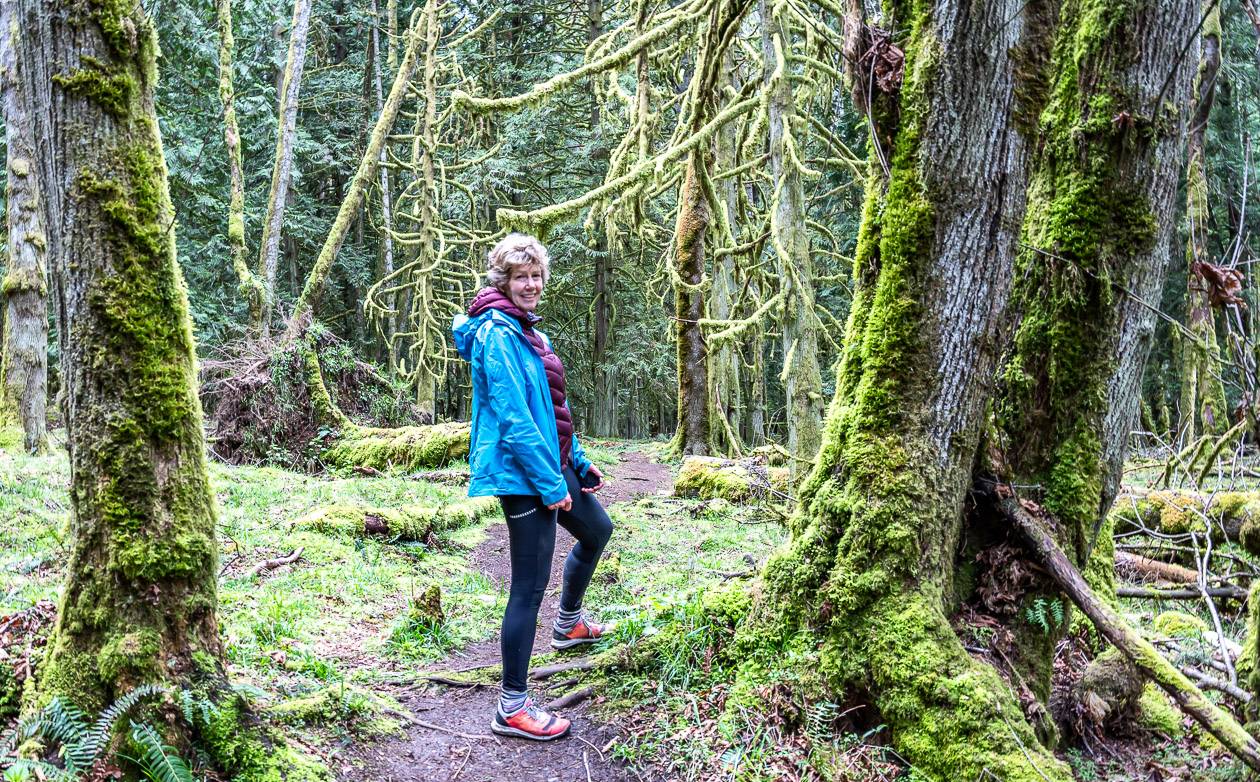 Enjoying the mossy Chris Hatfield Trail