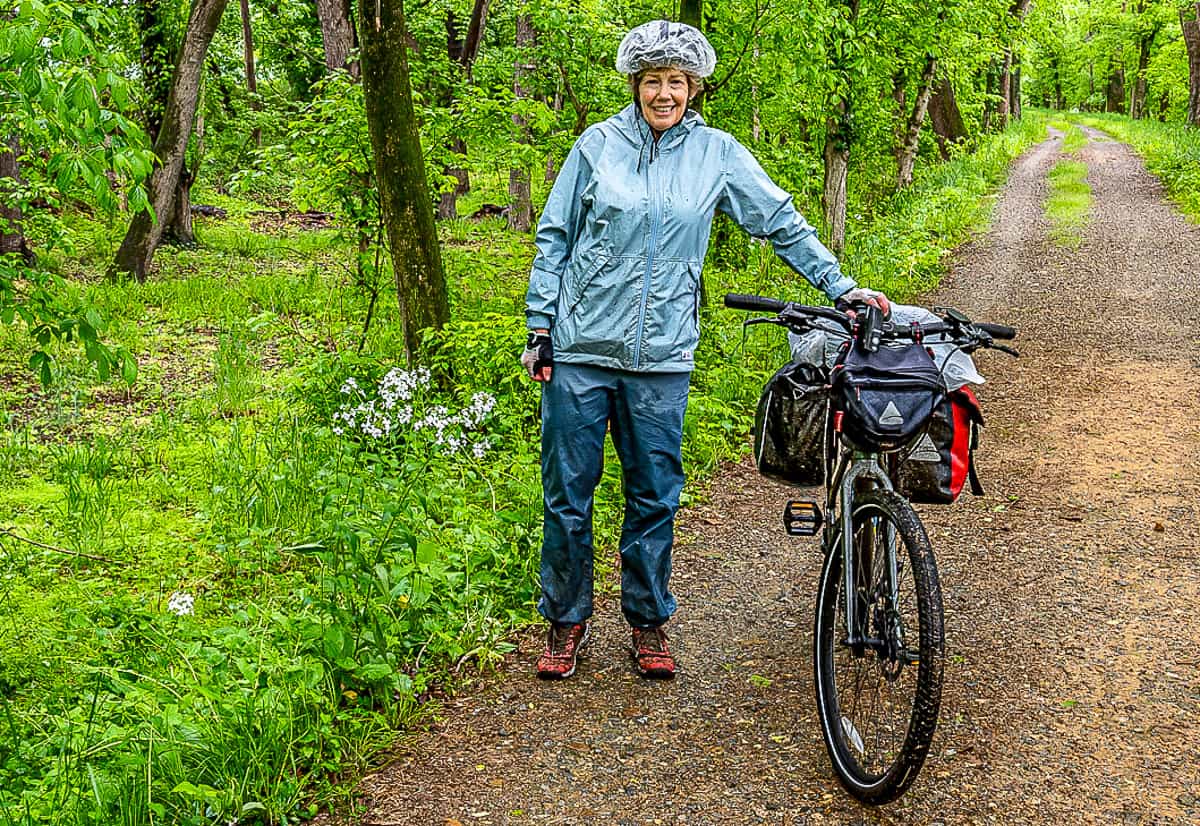 Don't judge my head gear - a shower cap over a helmet is cooler for cycling than wearing a hood! Sporting both the Aquanator jacket and pants