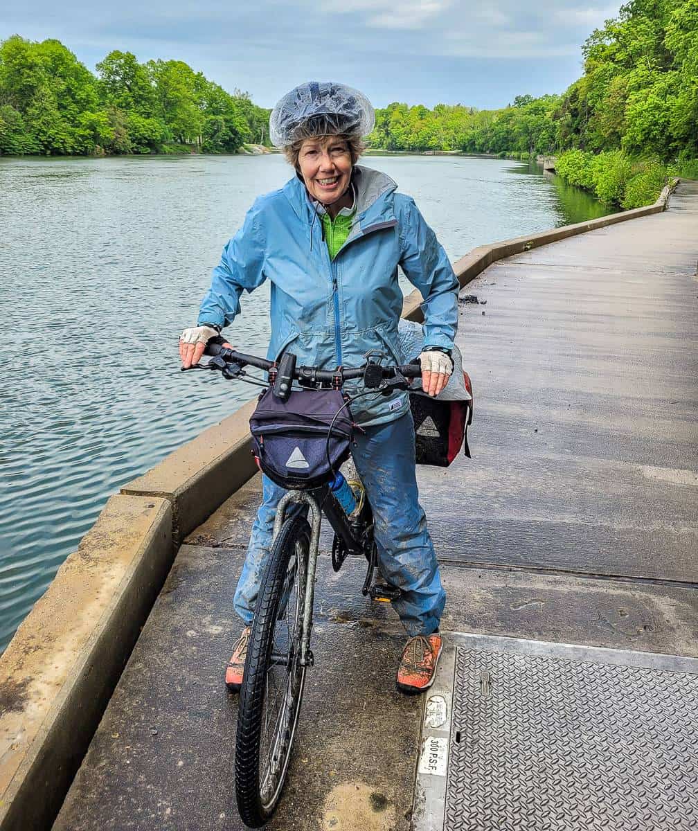 I'm a prize covered in mud - and sporting a shower cap - but it does keep your hair dry