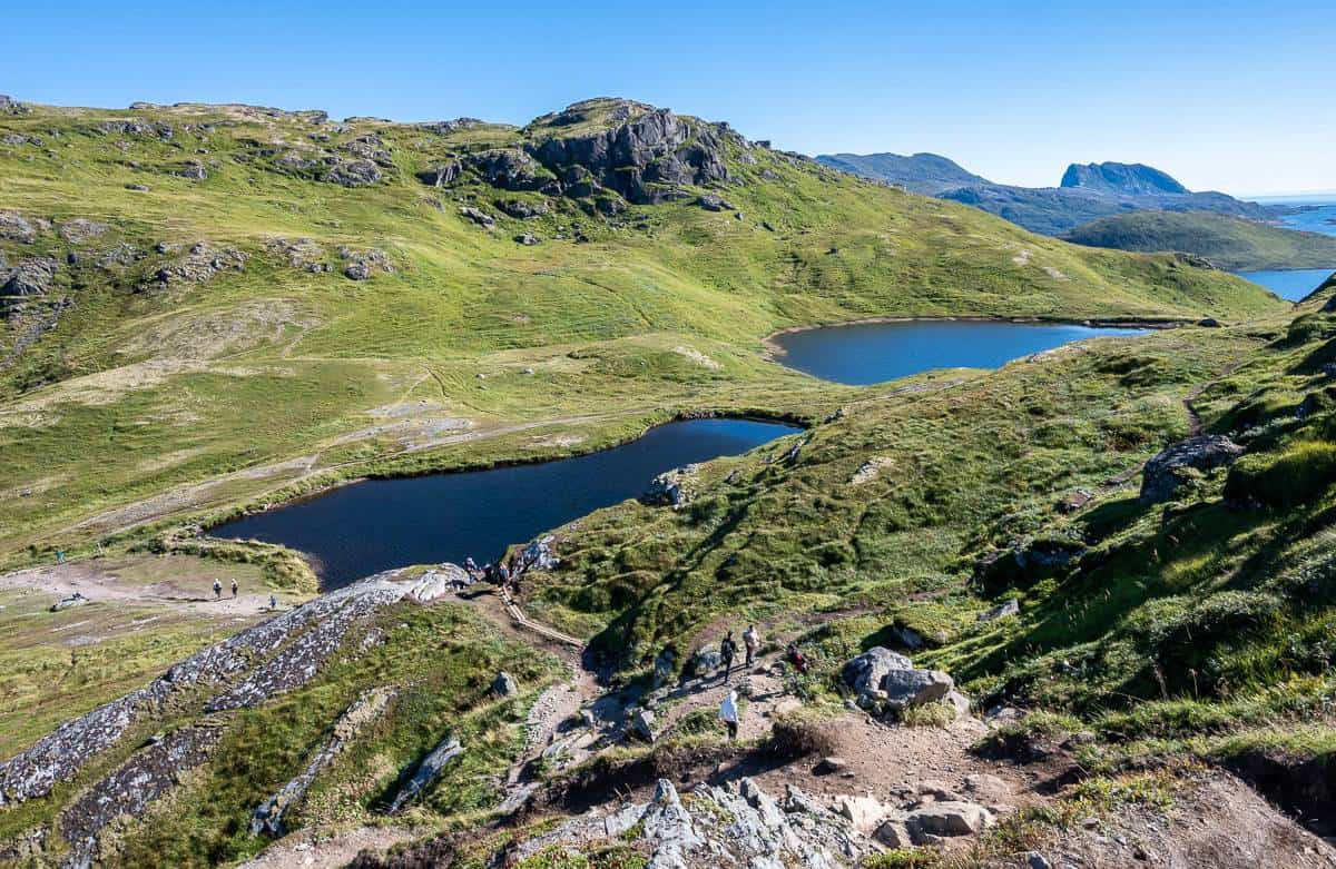 Pass two flat lakes and then climb steeply for a short distance 