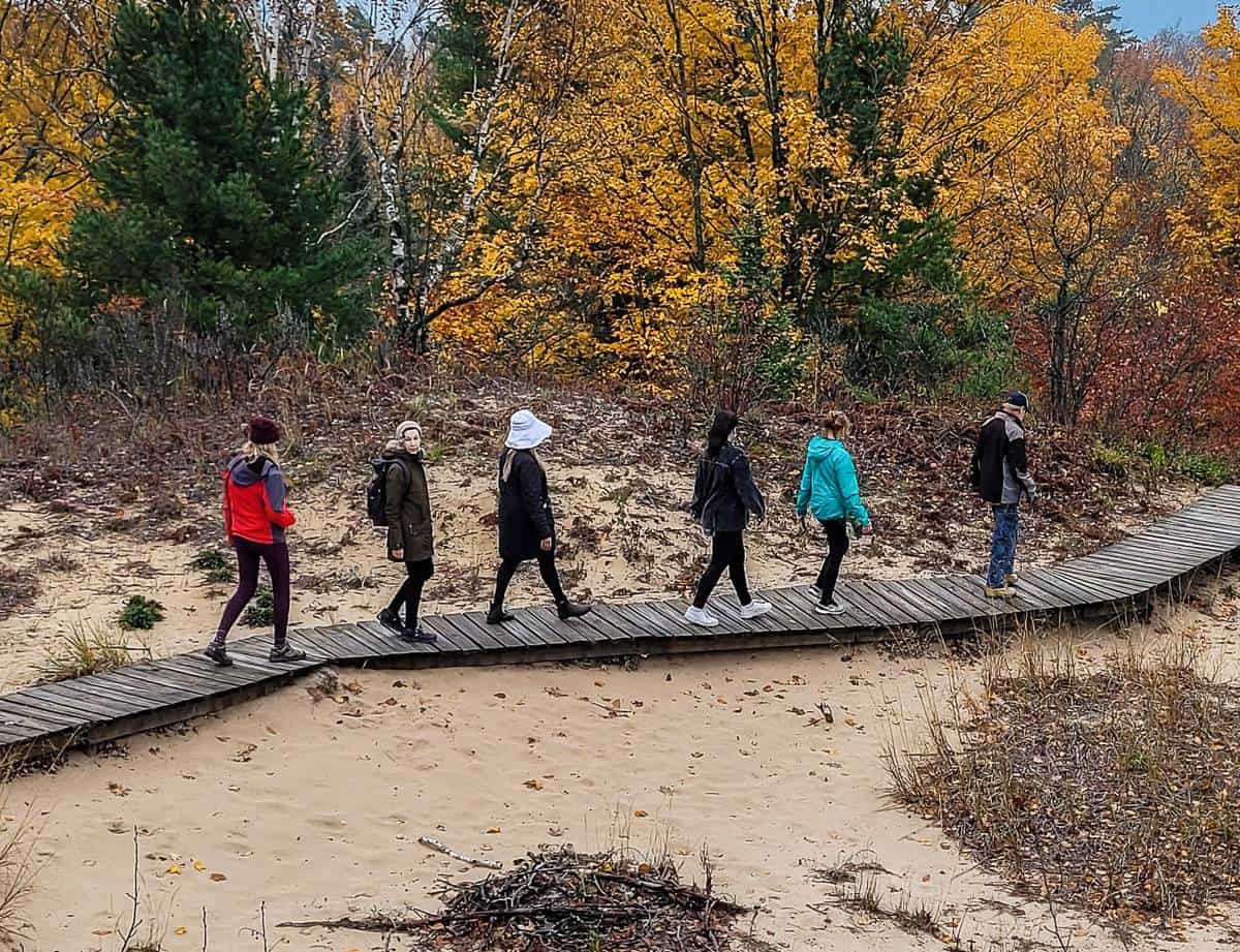 Sticking to the boardwalk to protect the sand dunes virtually Old Baldy