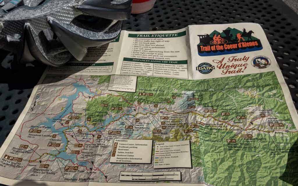 There are maps of the Trail of the Coeur d'Alenes at most trailheads