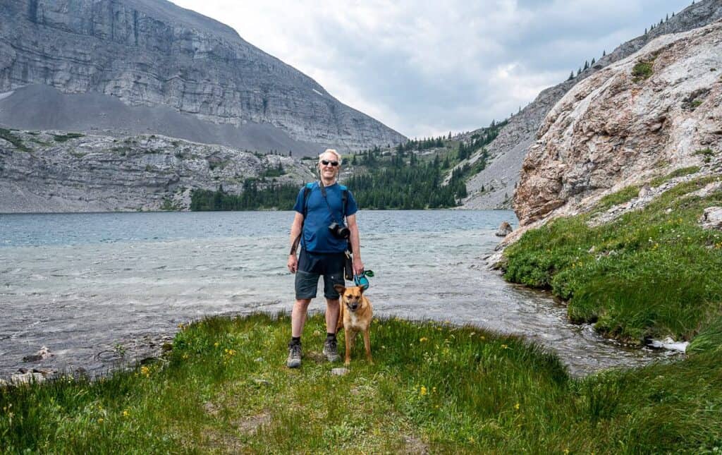 John with Mila at Carnarvon Lake - the camping is in the trees at the end of the lake