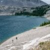 Looking down on a couple of backpackers as they make their way to the campsites at the far end of Carnarvon Lake