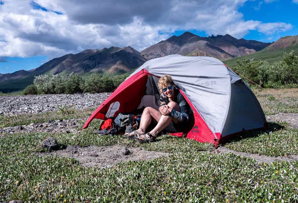 Camping on a grassy gravel outwash near the mouth of the Dixon River