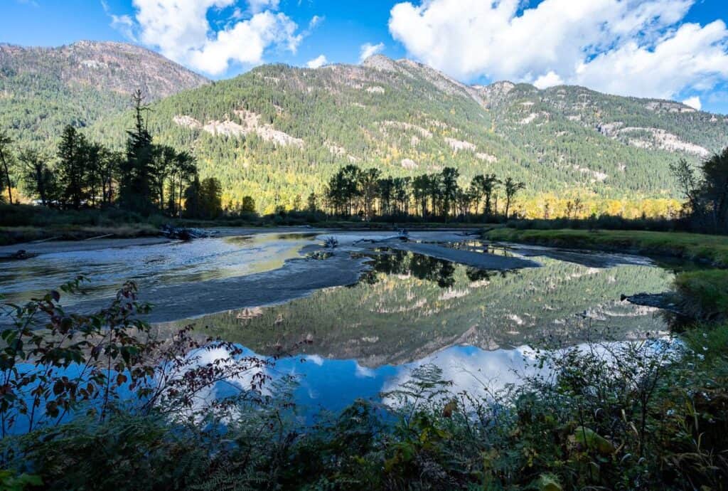 Bike early in the morning if you want to catch beautiful reflections in the Slocan River between Winlaw and Passmore