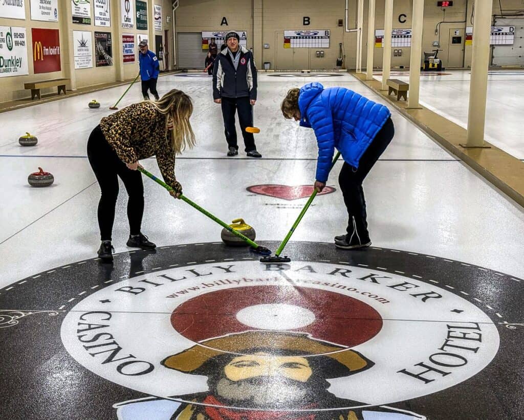 I understand the appeal of curling after our lesson - more finesse and muscle power needed than I figured