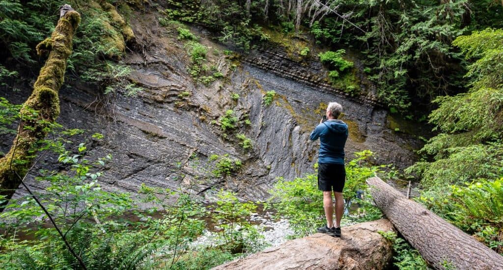 John the geologist admiring all the folding in the rocks just down from the Hole in the Wall