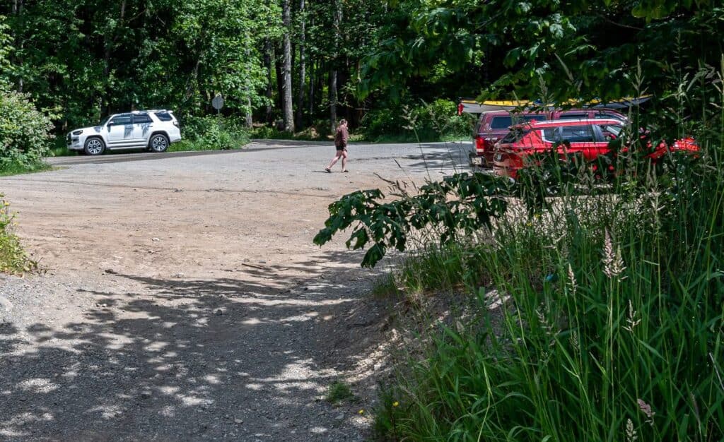 Take a right off the paved road and you'll find this large parking lot across the highway from the trailhead
