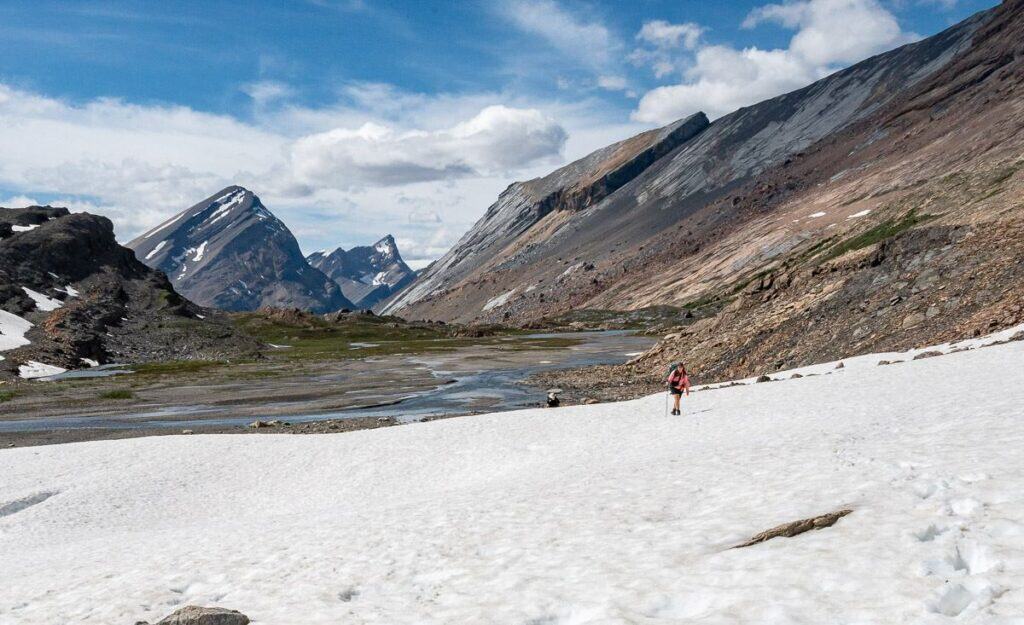 Crossing a snowfield while backpacking up to Cataract Pass