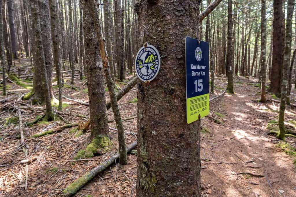 Kilometre markers on the Fundy Footpath trail are very visible