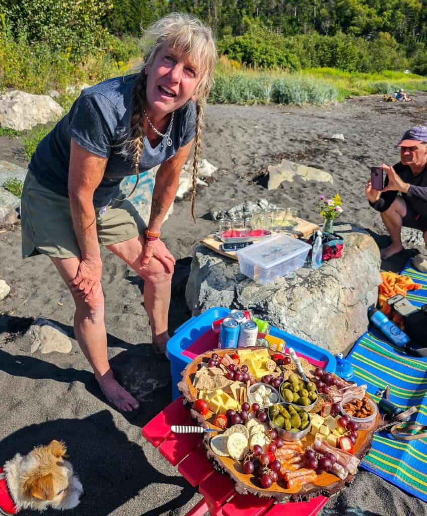 Marguerite of In Step Adventures with her signature charcuterie board - a great way to end my kayaking trip to Black Beach