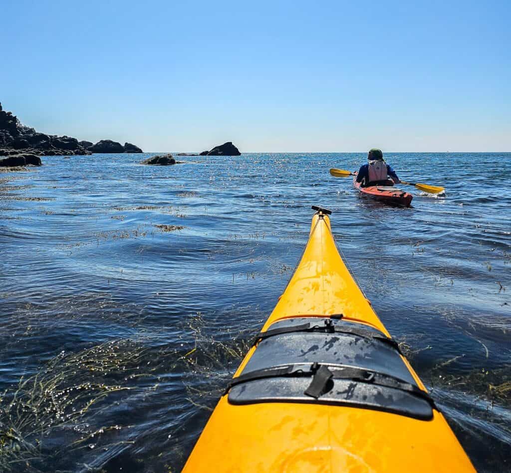 Fantastic conditions kayaking in the afternoon towards Black Beach