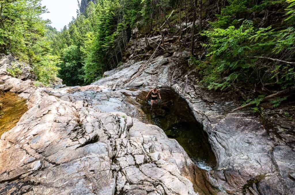 Stepping into the deepest of the pools above the waterfall is a very cool thing to do